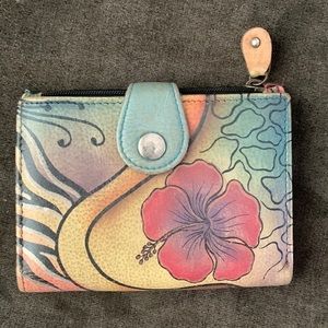 Hand painted, genuine leather Anuschka wallet.